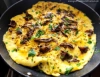 COMPOSER VOTRE PETIT DEJEUNER Omelette Khlii - La Tuniserie "Commandez en ligne chez La Tuniserie et régalez-vous avec nos brunchs gourmands, burgers généreux et plats maison, livrés directement chez vous, sans compromis sur la qualité."