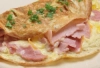 COMPOSER VOTRE PETIT DEJEUNER Omelette Jambon Fumée  - La Tuniserie "Commandez en ligne chez La Tuniserie et régalez-vous avec nos brunchs gourmands, burgers généreux et plats maison, livrés directement chez vous, sans compromis sur la qualité."