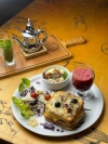 PETIT DÉJEUNER (Jusqu'à 14h) French DELIV - La Tuniserie "Commandez en ligne chez La Tuniserie et régalez-vous avec nos brunchs gourmands, burgers généreux et plats maison, livrés directement chez vous, sans compromis sur la qualité."