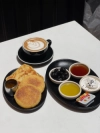 PETIT DÉJEUNER (Jusqu'à 14h) Baba Ali DELIV - La Tuniserie "Commandez en ligne chez La Tuniserie et régalez-vous avec nos brunchs gourmands, burgers généreux et plats maison, livrés directement chez vous, sans compromis sur la qualité."